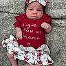 baby, infant, child, onesie, headband, bow, floral, skirt, blanket, clothing, cute, portrait, face, hands, feet, lying_down, soft_texture, indoor, expression, newborn