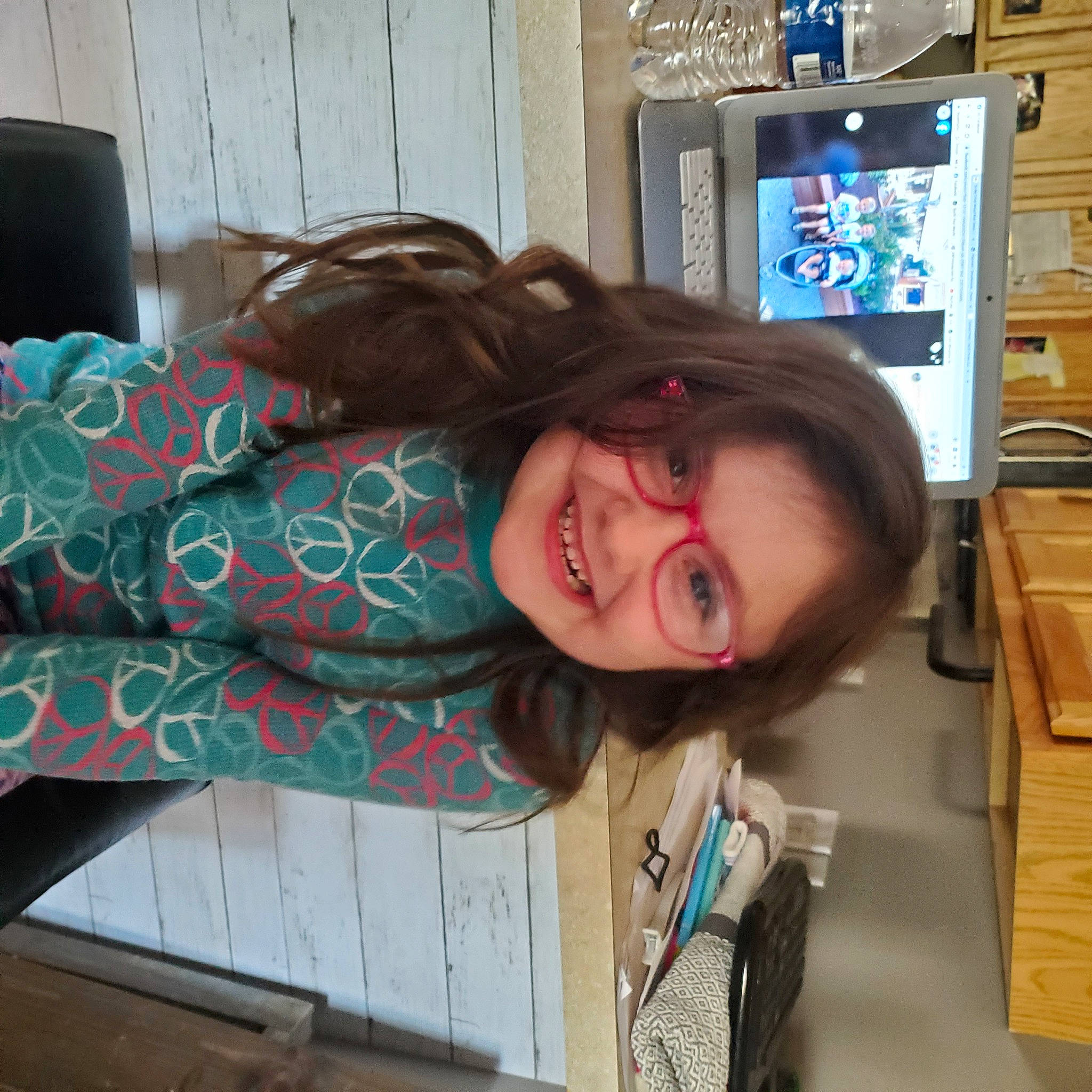 Nora joined the competition — help win amazing prizes! cabinetry, child, display_device, eyewear, fun, hair_coloring, happy, home_appliance, jaw, joy, long_hair, machine, mammal, mouth, pattern, person, room, selfie, shelf, smile