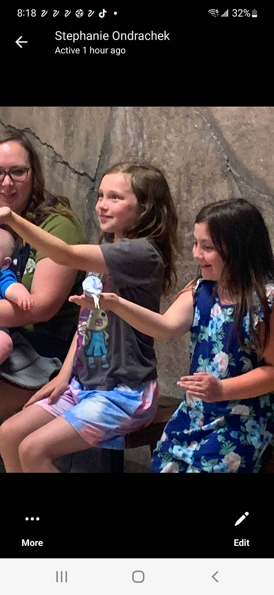 Lilly is registered to the contest to win money with this photo: arm, child, electric_blue, entertainment, event, facial_expression, fun, gesture, grass, hand, happy, joy, leisure, people_in_nature, person, photograph, recreation, shorts, smile, snapshot