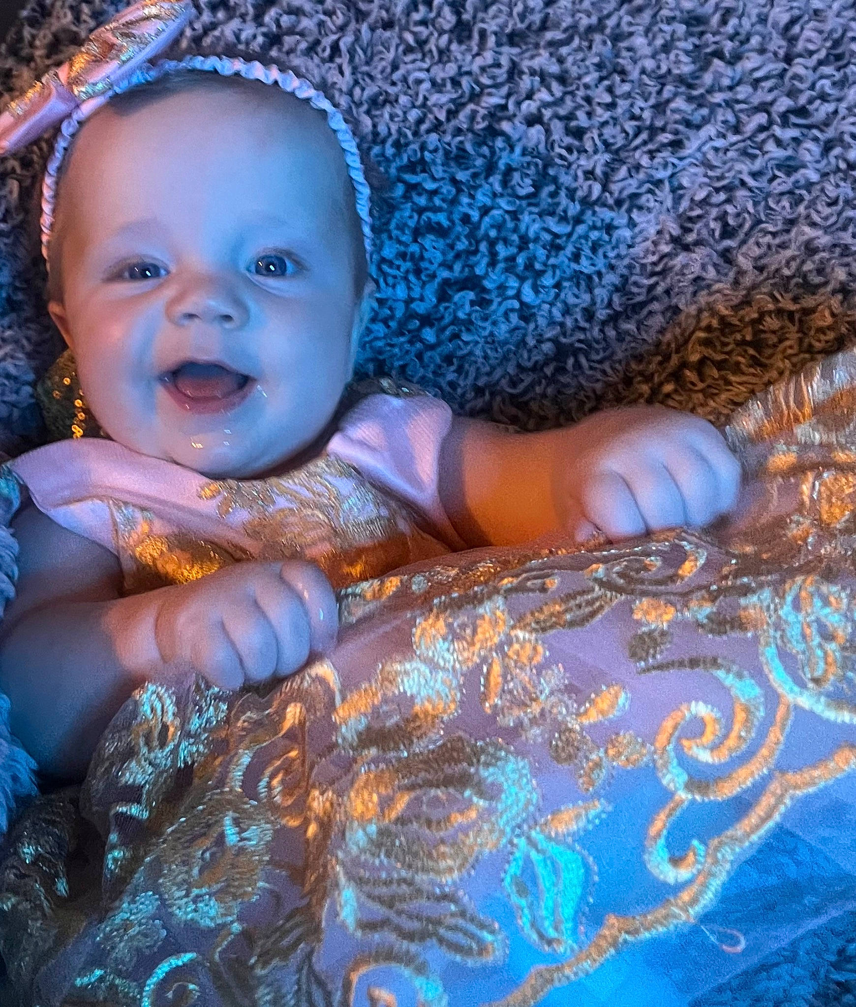 Gwendolyn joined the competition — help win amazing prizes! azure, baby, baby_toddler_clothing, child, cool, electric_blue, flash_photography, fun, grass, happy, human_body, iris, linens, pattern, people_in_nature, person, portrait_photography, sitting, smile, textile
