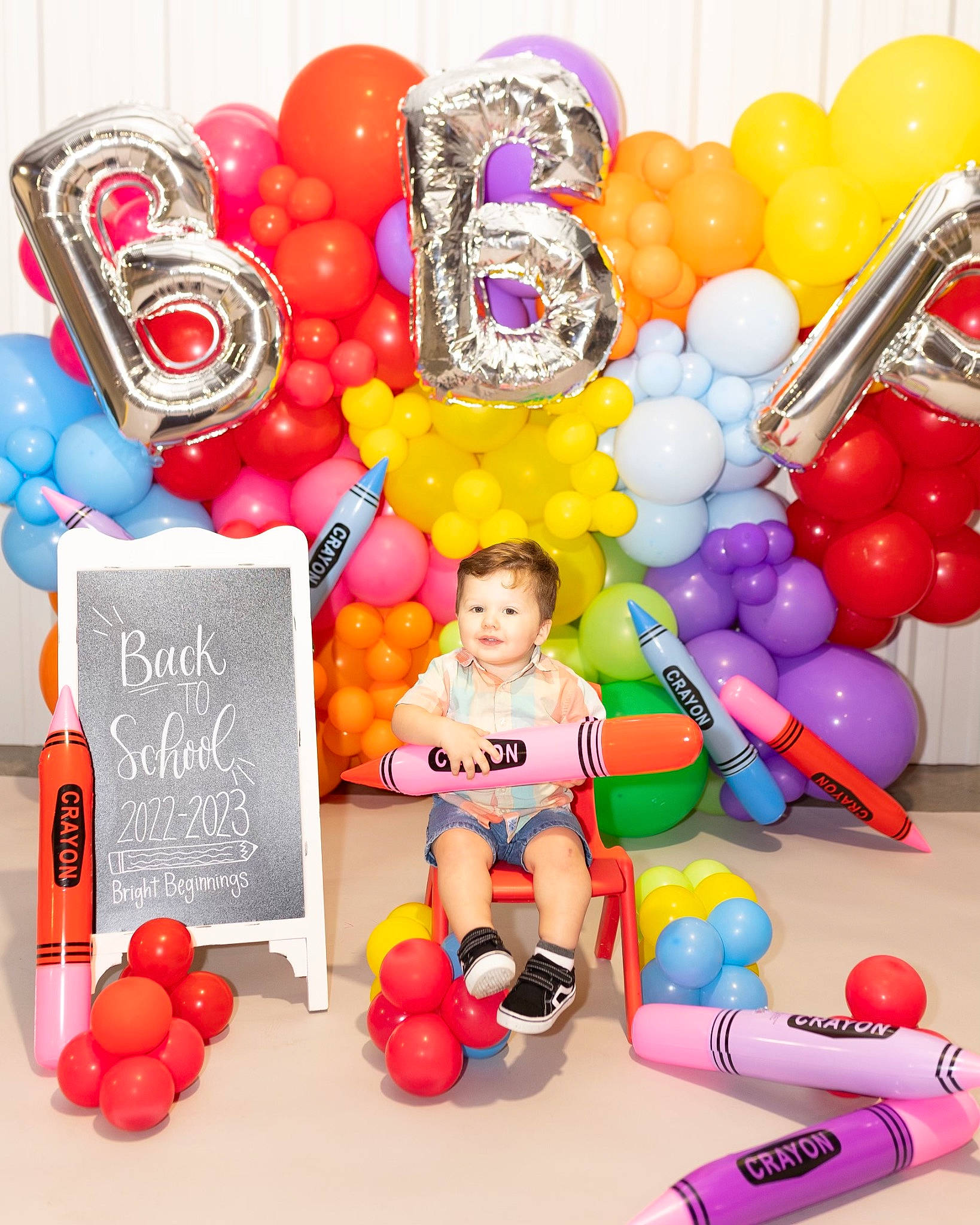 Aspen is registered to the contest to win money with this photo: arch, balloon, candy, child, event, font, food_group, fun, happy, joy, natural_foods, party, party_supply, person, product, recipe, recreation, room, superfood, sweetness