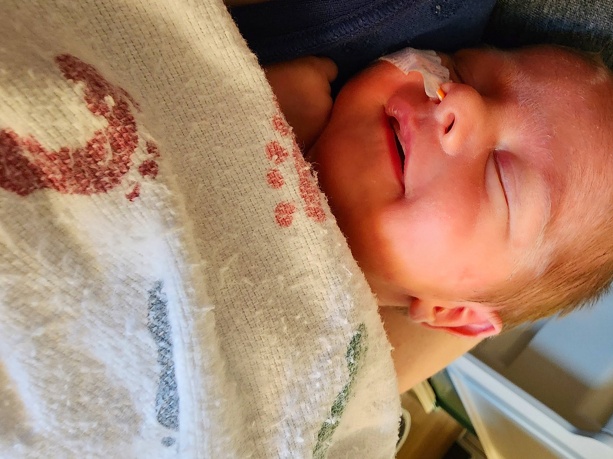 Willow is registered to the contest to win money with this photo: baby, baby_products, baby_toddler_clothing, cheek, child, comfort, eye, eyebrow, eyelash, happy, iris, linens, lip, neck, nose, pattern, person, skin, sleeve, textile