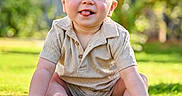 Lawson joined the competition — help win amazing prizes! baby, casual_clothing, child, cute, daylight, grass, greenery, happy, infant, nature, outdoor, person, playful, portrait, short_hair, sitting, smiling, sunlight, tongue_out, young