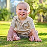 baby, casual_clothing, child, cute, daylight, grass, greenery, happy, infant, nature, outdoor, person, playful, portrait, short_hair, sitting, smiling, sunlight, tongue_out, young