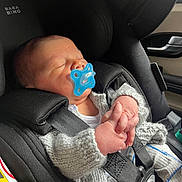 Lawson joined the competition — help win amazing prizes! baby, pacifier, car_seat, child, sleeping, infant, knitted_sweater, seatbelt, hands, clothing, car_interior, peaceful, cute, newborn, face, person, transportation, safety, resting, comfort