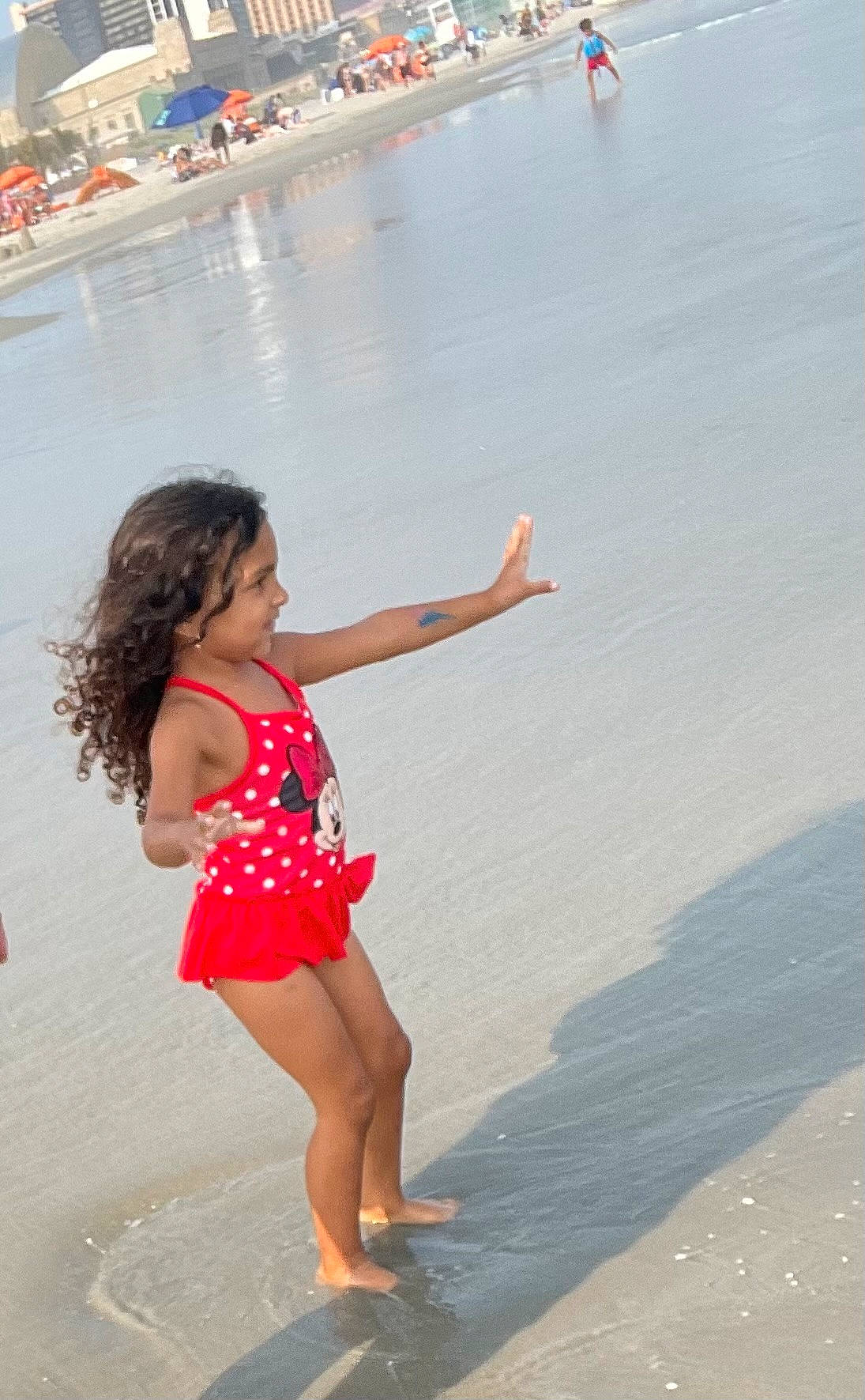 Loveli is registered to the contest to win money with this photo: barefoot, beach, event, foot, fun, happy, human_leg, leisure, ocean, people_on_beach, person, recreation, sand, summer, thigh, toddler, travel, trunk, vacation, waist