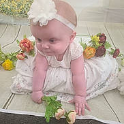 Isla-Louise joined the competition — help win amazing prizes! accessories, baby, clothing, daisy, dress, face, flower, flowerarrangement, flowerbouquet, geranium, head, ikebana, leaf, person, petal, photography, plant, portrait, pottedplant, rose