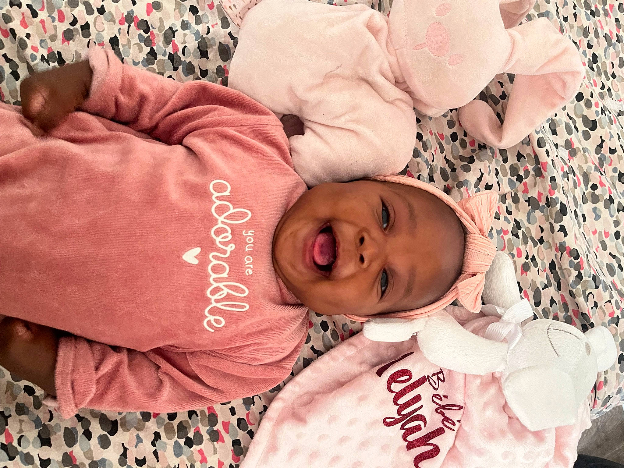 Melyah participe au concours pour gagner de l'argent avec cette photo : baby, baby_products, baby_toddler_clothing, bedtime, cheek, child, comfort, flesh, font, happy, human, linens, pattern, person, pink, sleep, sleeve, t_shirt, textile, toddler