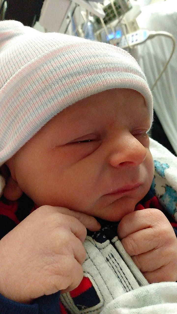 Michael joined the competition — help win amazing prizes! baby, cap, cheek, chin, comfort, facial_expression, finger, gesture, hand, headwear, human, lip, mouth, nose, organ, person, pink, product, skin, smile