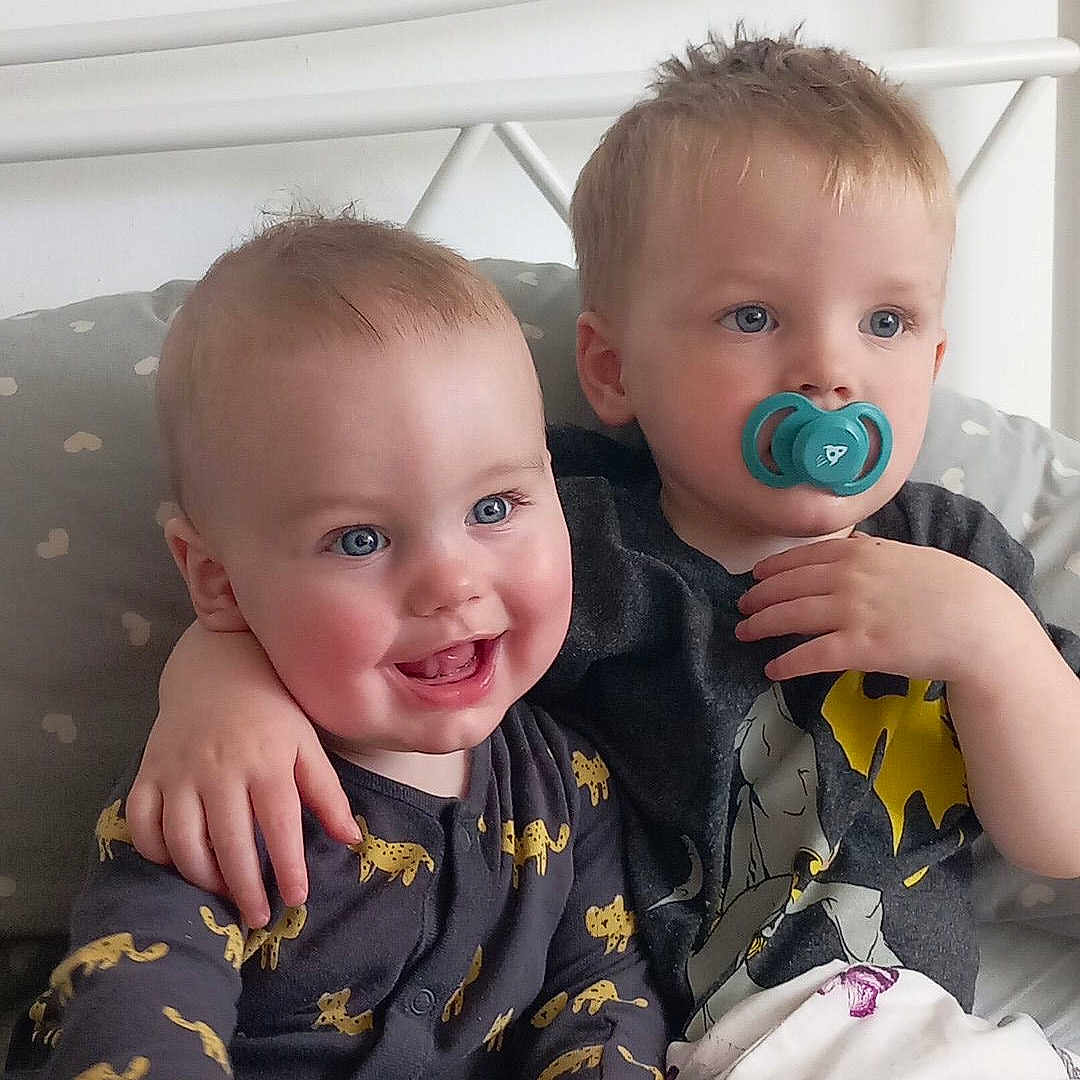 Kaisen joined the competition — help win amazing prizes! baby, bed, bedroom, clothing, couch, cushion, face, furniture, happy, head, homedecor, indoors, laughing, pajamas, person, photography, portrait, room, sitting, smile