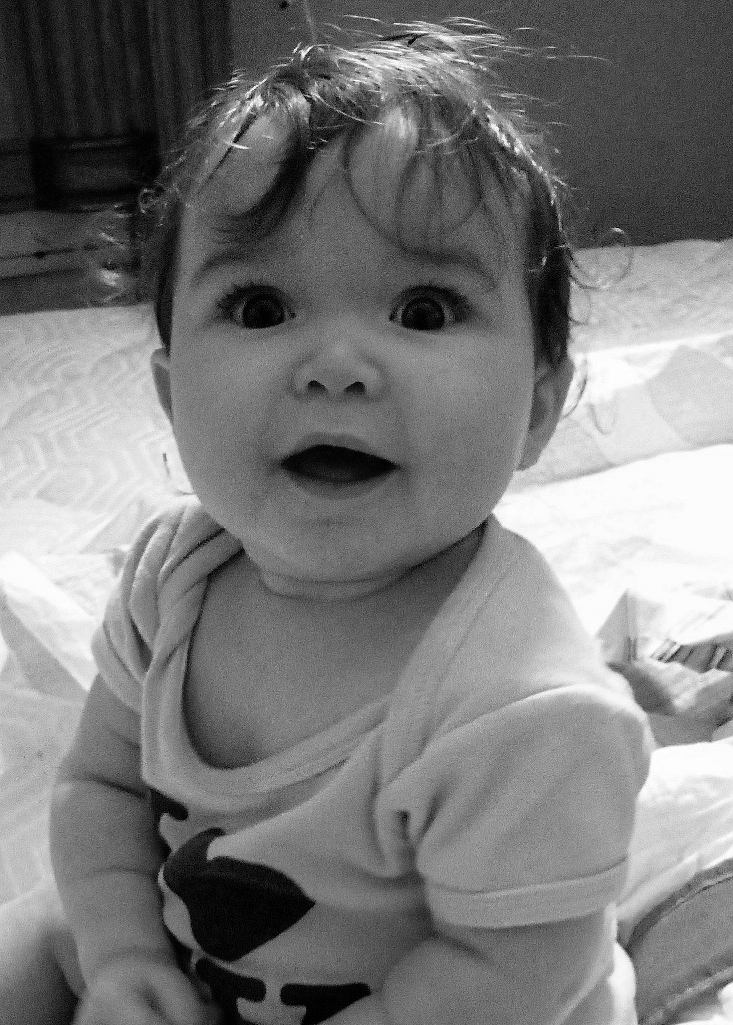 Joslyn is registered to the contest to win money with this photo: arm, baby, black, cheek, ear, eyebrow, face, hairstyle, happy, head, human_body, iris, lip, mouth, nose, organ, person, skin, sleeve, smile