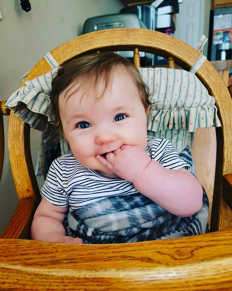 Coraline joined the competition — help win amazing prizes! baby, baby_toddler_clothing, chair, cheek, child, chin, comfort, eyelash, fashion_accessory, fun, hairstyle, hat, iris, joy, person, room, sitting, skin, smile, toddler