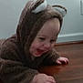 Jacob joined the competition — help win amazing prizes! baby, child, costume, bear, hood, crawling, floor, wooden_floor, smiling, happy, indoors, cute, infant, toddler, playful, clothing, young_child, face, hand, expression