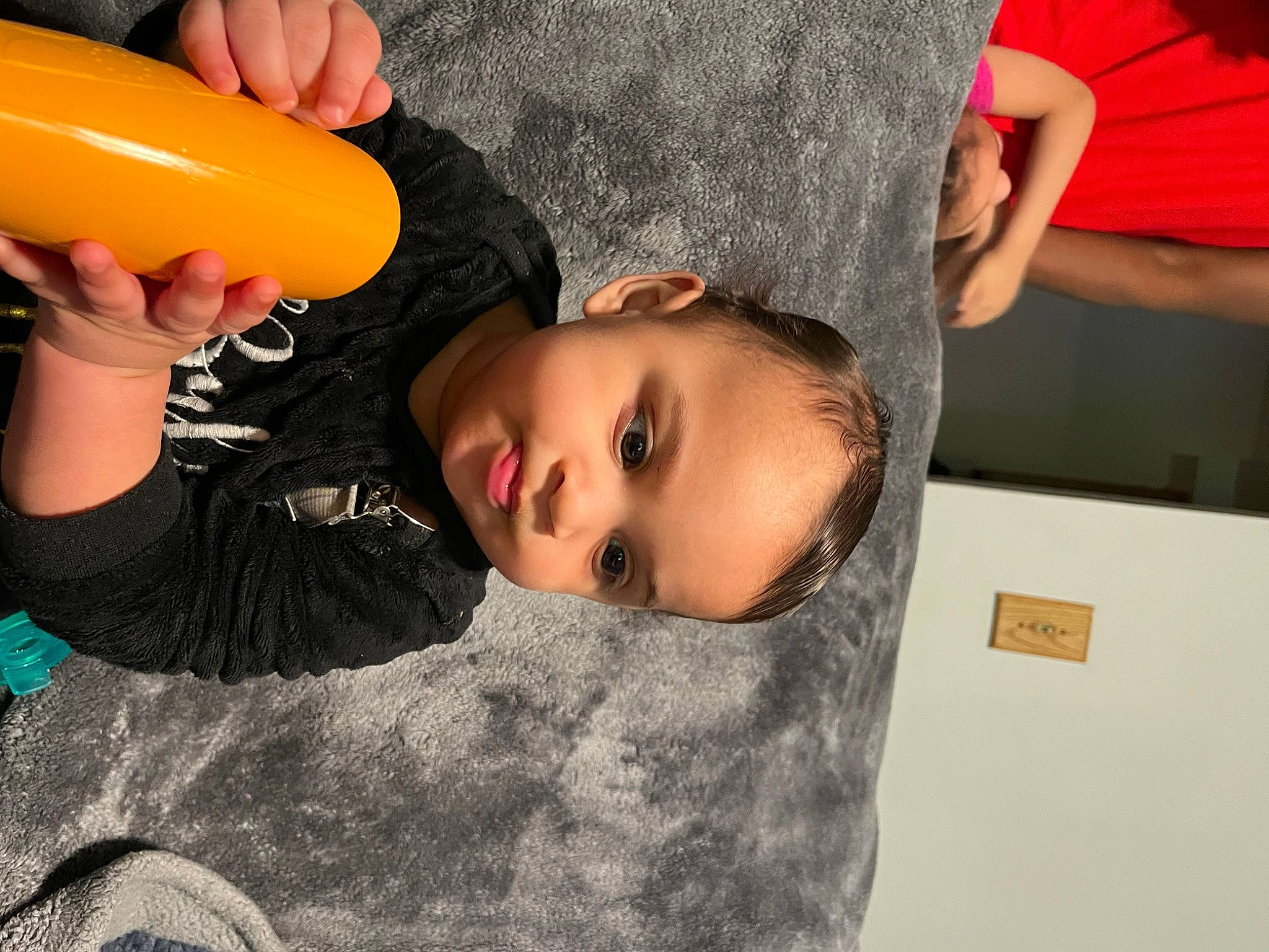 Amir is registered to the contest to win money with this photo: child, drinkware, eyelash, fun, happy, nose, person, plastic, room, t_shirt, toddler