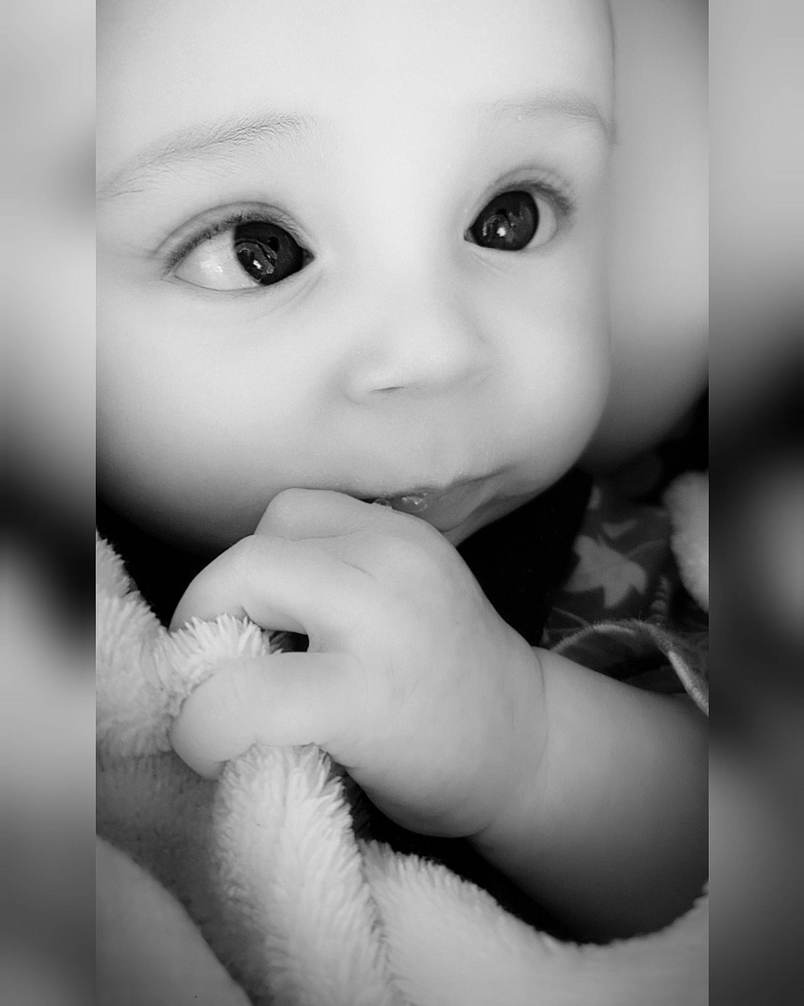 Aspyn Kay is registered to the contest to win money with this photo: baby, black_and_white, cheek, close_up, eyebrow, eyelash, flash_photography, gesture, happy, iris, lip, monochrome, monochrome_photography, mouth, nail, nose, person, skin, style, thumb