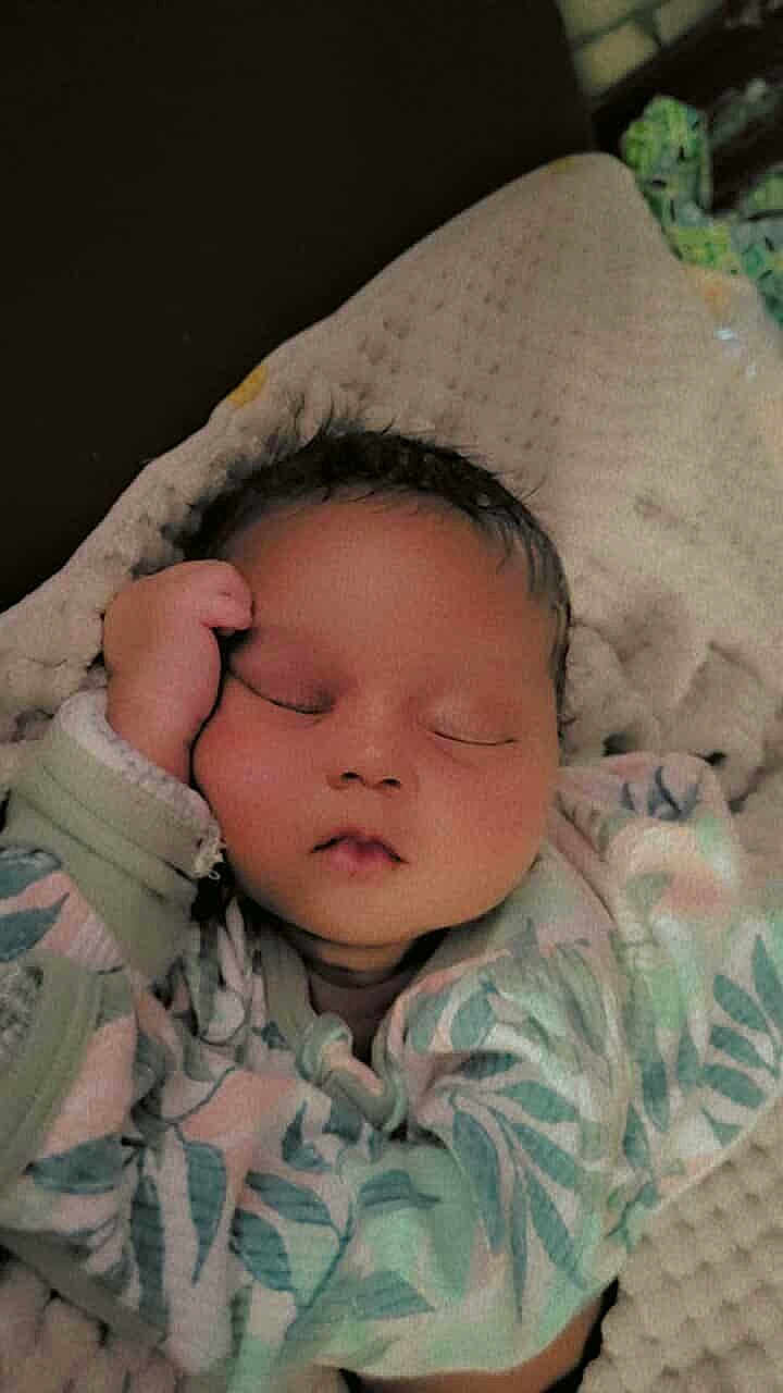 Dezeriah Sparks is registered to the contest to win money with this photo: baby, sleeping, infant, face, hand, blanket, clothing, pattern, leaf, soft, cute, peaceful, rest, indoors, portrait, newborn, child, cozy, babywear, relaxation