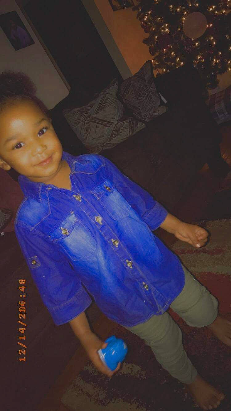 Isabella is registered to the contest to win money with this photo: baby_toddler_clothing, blue, boot, button, christmas, christmas_decoration, christmas_eve, cobalt_blue, cool, denim, electric_blue, eye, holiday, human_body, iris, joy, living_room, ornament, overall, person