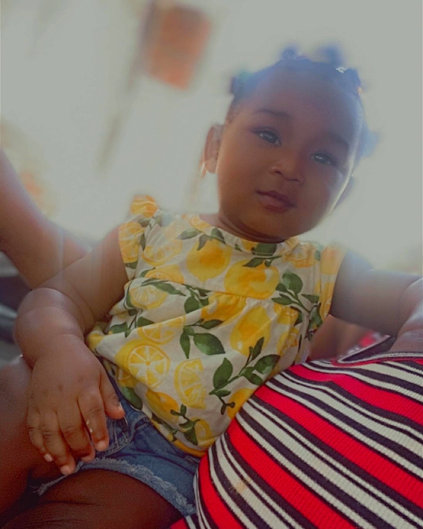 Samone joined the competition — help win amazing prizes! black_hair, child, comfort, elbow, fun, gesture, happy, human_body, human_leg, knee, leisure, neck, nose, person, sitting, skin, sleeve, t_shirt, thigh, toddler