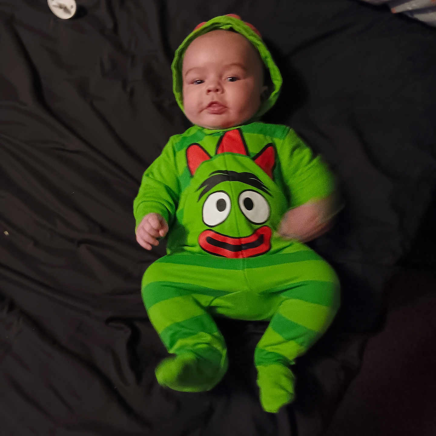 Rodney is registered to the contest to win money with this photo: applique, baby, bodypart, bonnet, cap, clothing, face, finger, hand, hat, head, hood, hoodie, knitwear, newborn, person, photography, portrait, sweater, sweatshirt