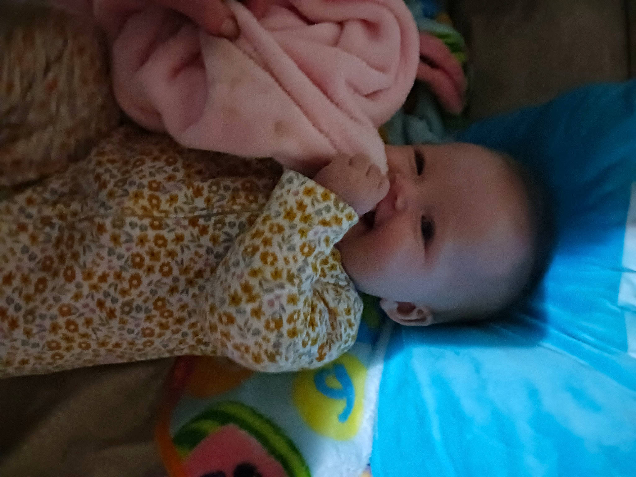 Nova is registered to the contest to win money with this photo: baby, baby_products, baby_toddler_clothing, beauty, cheek, child, close_up, comfort, eye, finger, grass, head, iris, linens, mouth, nose, person, skin, textile, thumb