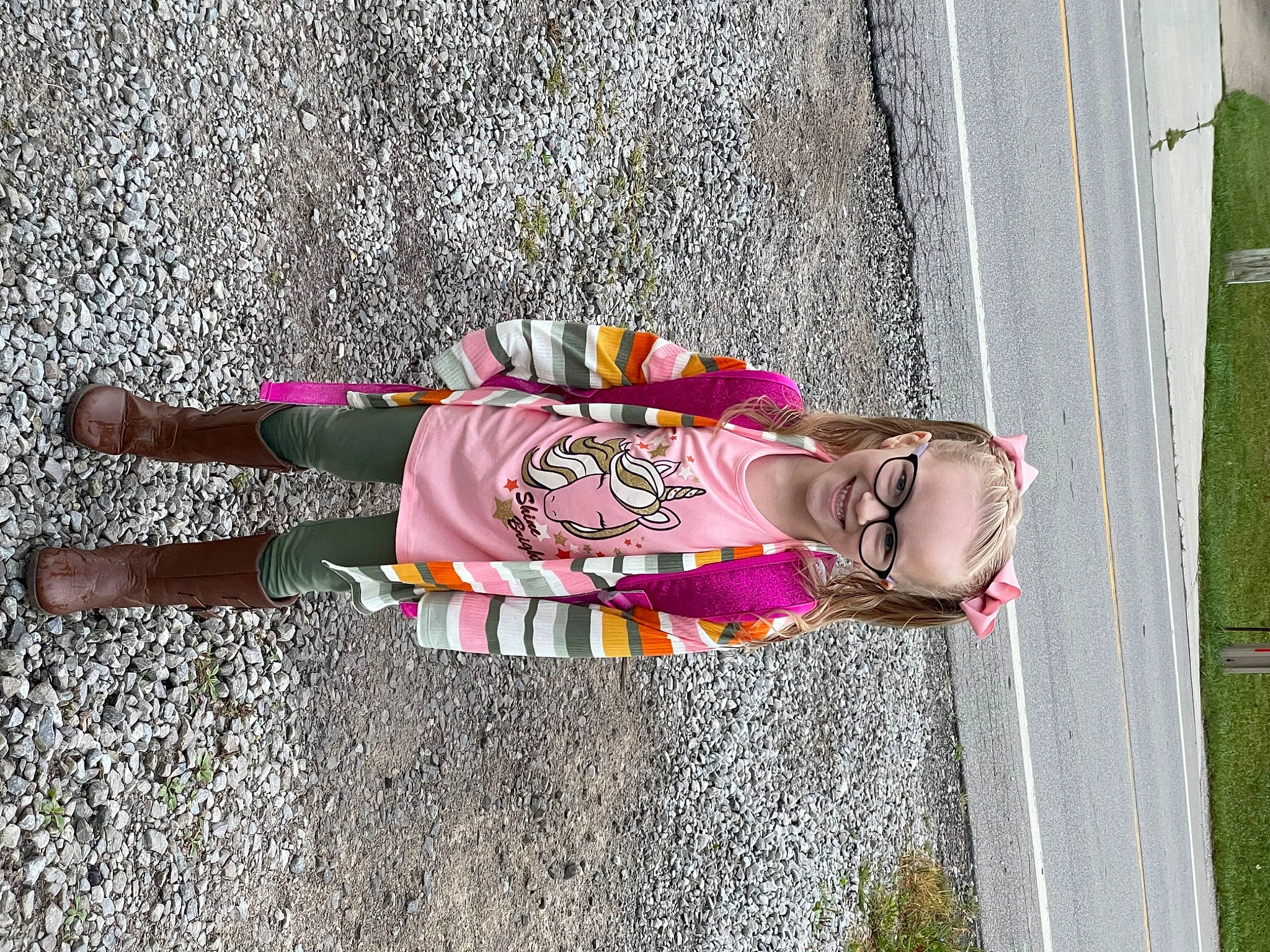 Bryleigh is registered to the contest to win money with this photo: art, asphalt, concrete, costume, dress, event, human_leg, joy, magenta, person, pink, road, road_surface, shadow, sidewalk, smile, street, tar, visual_arts, wrist