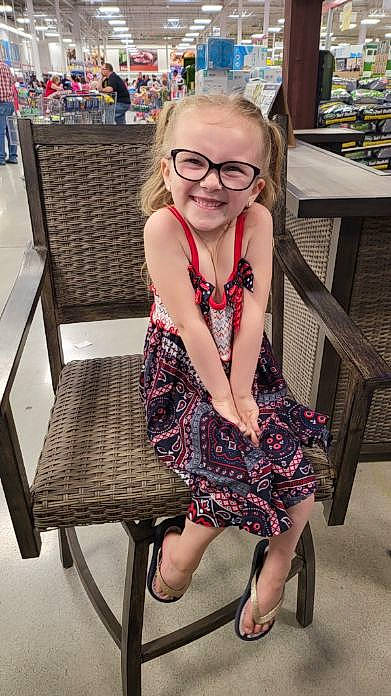 Bryleigh joined the competition — help win amazing prizes! chair, day_dress, eyewear, fashion_design, fun, glasses, hairstyle, happy, joint, joy, knee, leisure, pattern, person, photograph, purple, smile, snapshot, standing, summer
