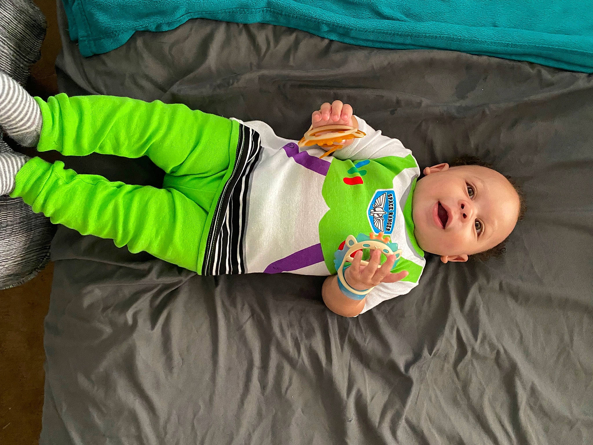 Aaron joined the competition — help win amazing prizes! baby, baby_products, baby_toddler_clothing, child, comfort, fun, linens, pattern, person, personal_protective_equipment, product, room, sitting, sleeve, smile, sock, sportswear, textile, thigh, toddler