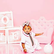 Londyyn joined the competition — help win amazing prizes! baby, child, girl, pink, birthday, blocks, one, headband, bow, dress, armchair, ottoman, balloon, floor, studio, portrait, cute, celebration, smiling, sitting