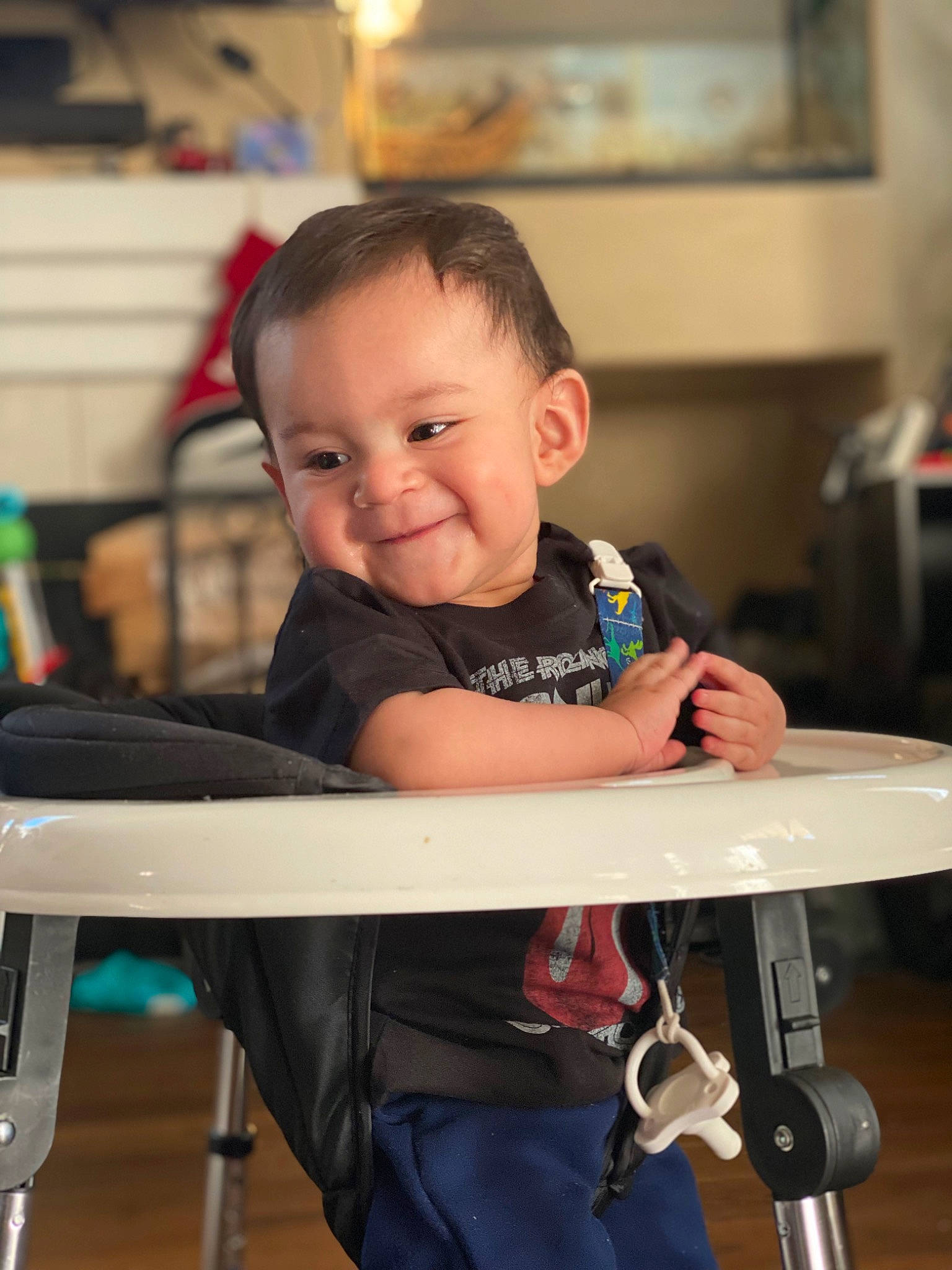 Matthew is registered to the contest to win money with this photo: baby, baby_toddler_clothing, chair, child, fun, furniture, happy, joy, person, room, sitting, sleeve, smile, t_shirt, toddler