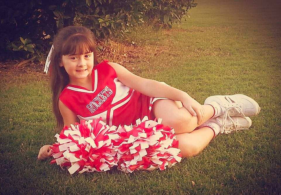 Lexis joined the competition — help win amazing prizes! beauty, child, cool, dress, flower, footwear, fun, grass, happy, human, joy, leg, person, photo_shoot, photography, pink, plant, sitting, sky, smile