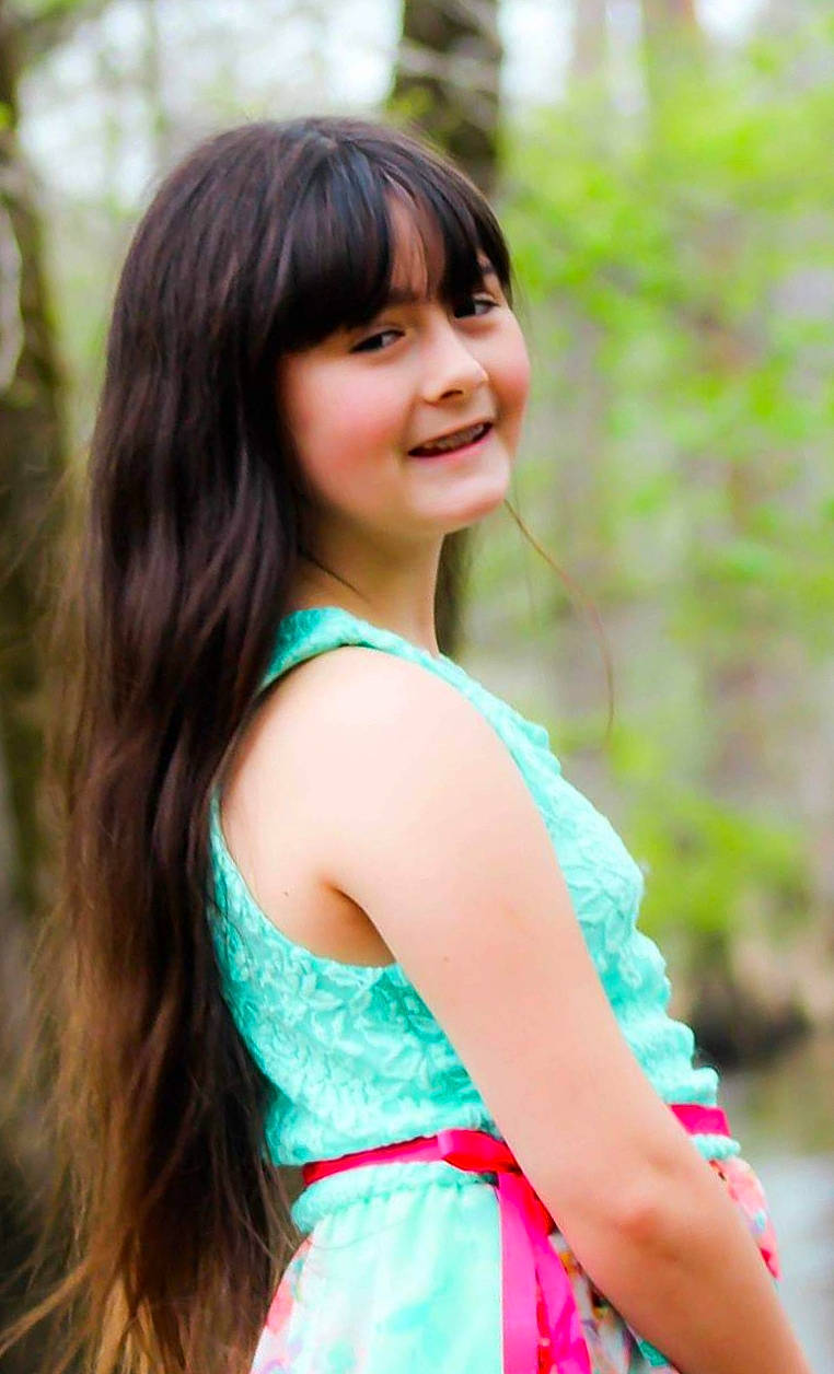 Lexis is registered to the contest to win money with this photo: beauty, black_hair, brown_hair, child_model, dress, fawn, hair, hair_coloring, hairstyle, joy, lady, long_hair, model, person, photo_shoot, photograph, photography, plant, portrait, portrait_photography