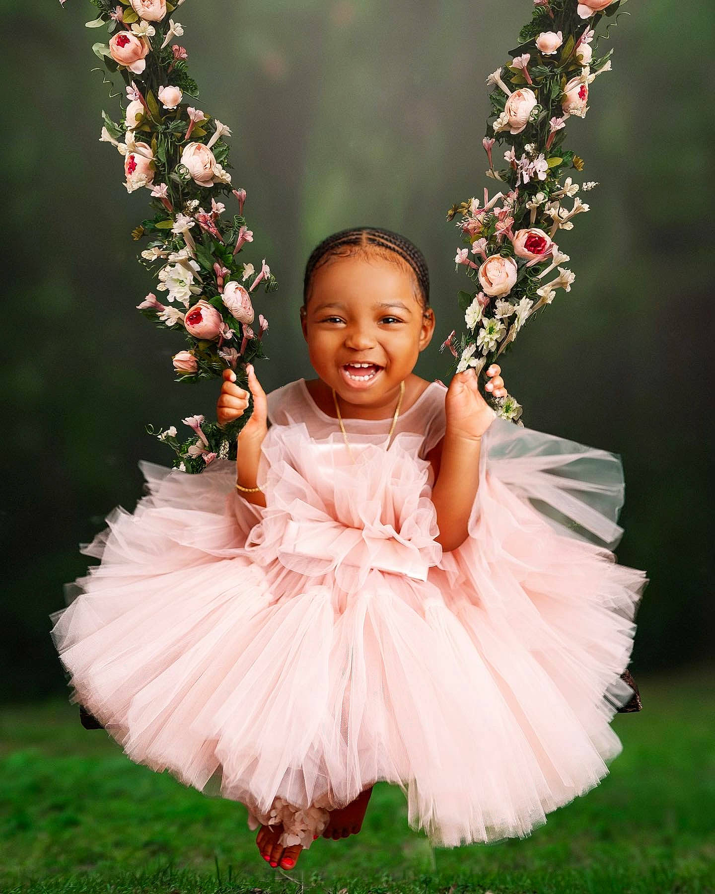 Kylani is registered to the contest to win money with this photo: baby_toddler_clothing, botany, bridal_accessory, day_dress, dress, event, eye, flash_photography, flower, grass, hair, happy, head, headpiece, leaf, person, petal, pink, plant, smile