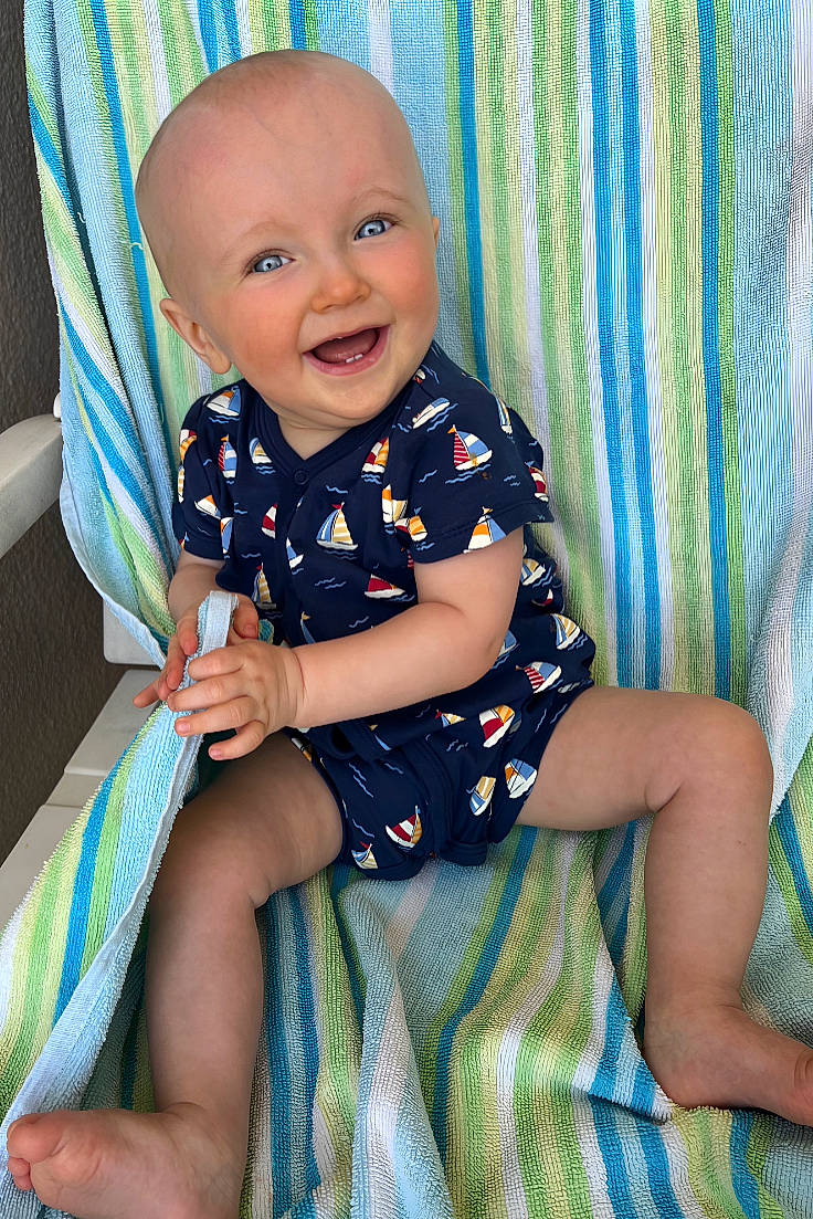 Ambrose joined the competition — help win amazing prizes! baby, baby_toddler_clothing, cheek, child, comfort, dress, eye, happy, head, human_body, iris, joy, leg, pattern, person, purple, skin, sleeve, smile, textile