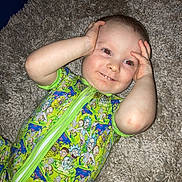 Billy joined the competition — help win amazing prizes! baby, child, onesie, rick_and_morty, carpet, smile, hands, face, red_eye, playful, cute, lying_down, infant, clothing, patterned, bright, skin, happy, expression, indoors