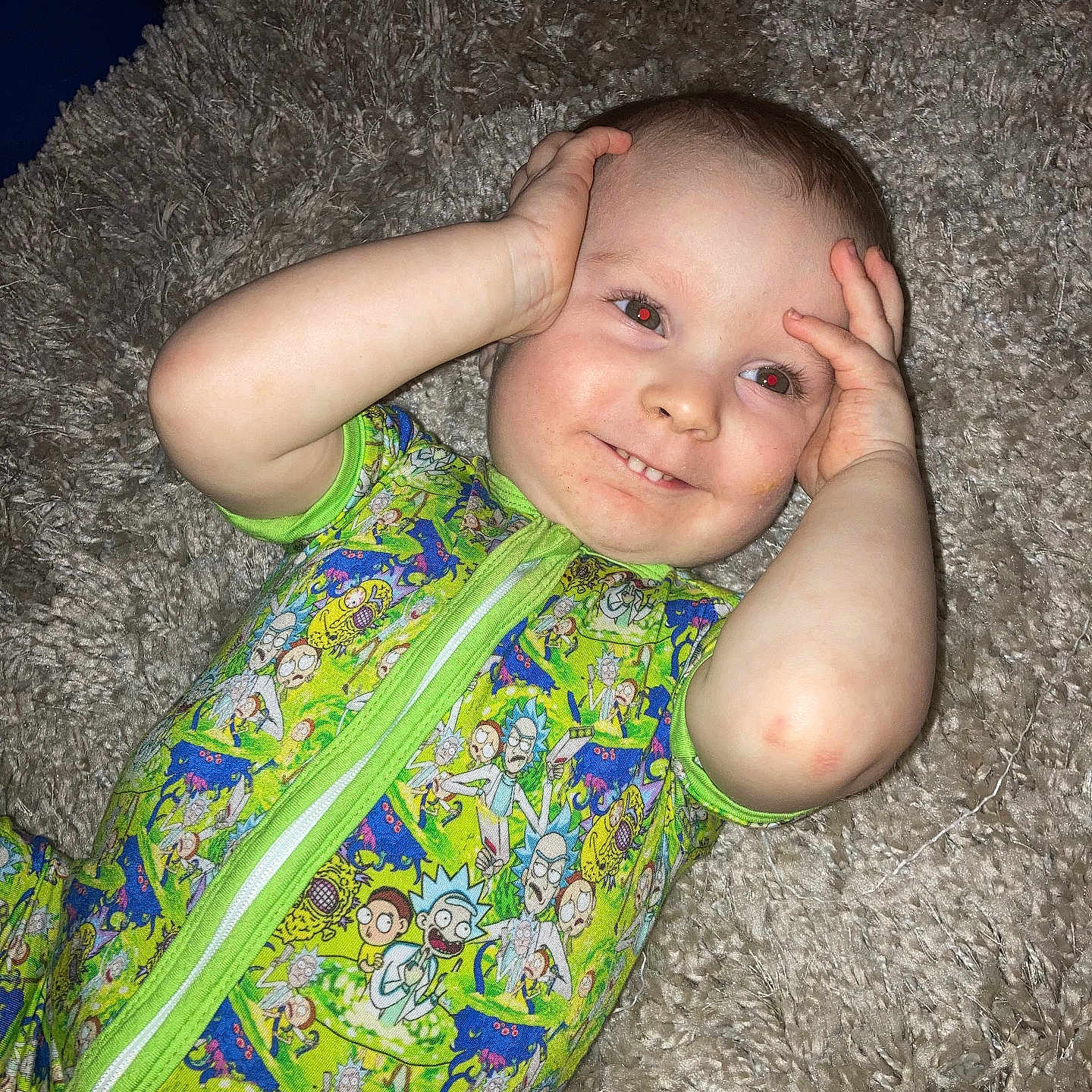 Billy joined the competition — help win amazing prizes! baby, bright, carpet, child, clothing, cute, expression, face, hands, happy, indoors, infant, lying_down, onesie, patterned, playful, red_eye, rick_and_morty, skin, smile