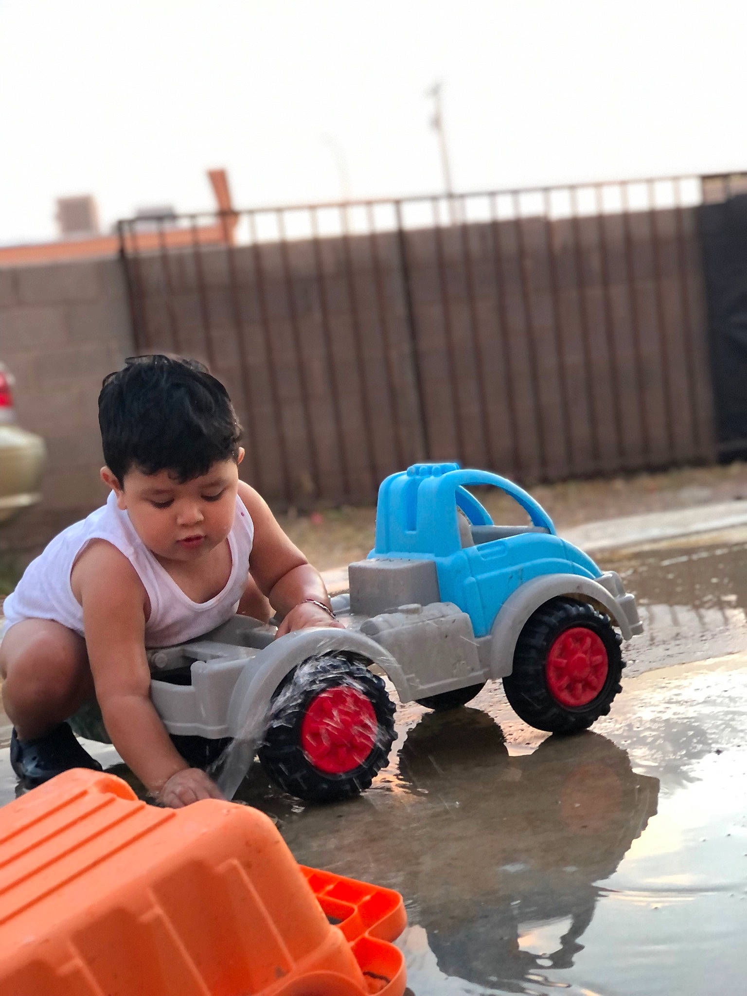 Cristian joined the competition — help win amazing prizes! automotive_design, automotive_exterior, automotive_tire, automotive_wheel_system, bumper, car, electric_blue, leisure, motor_vehicle, orange, person, recreation, rolling, shorts, sky, tire, travel, vehicle, vest, water