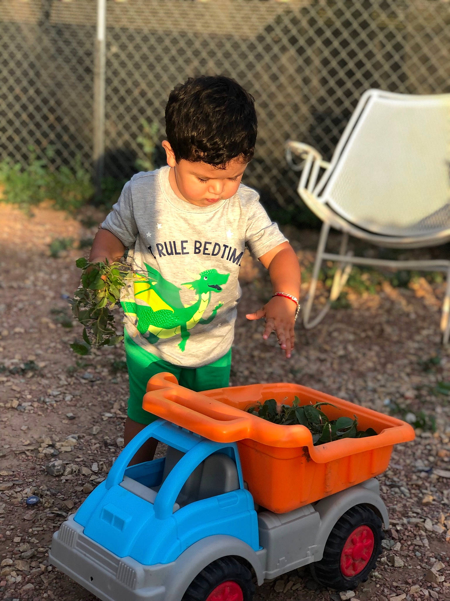 Cristian joined the competition — help win amazing prizes! automotive_tire, automotive_wheel_system, chair, child, fence, fun, grass, green, leisure, motor_vehicle, person, photograph, recreation, riding_toy, shorts, t_shirt, tire, toddler, toy, vehicle
