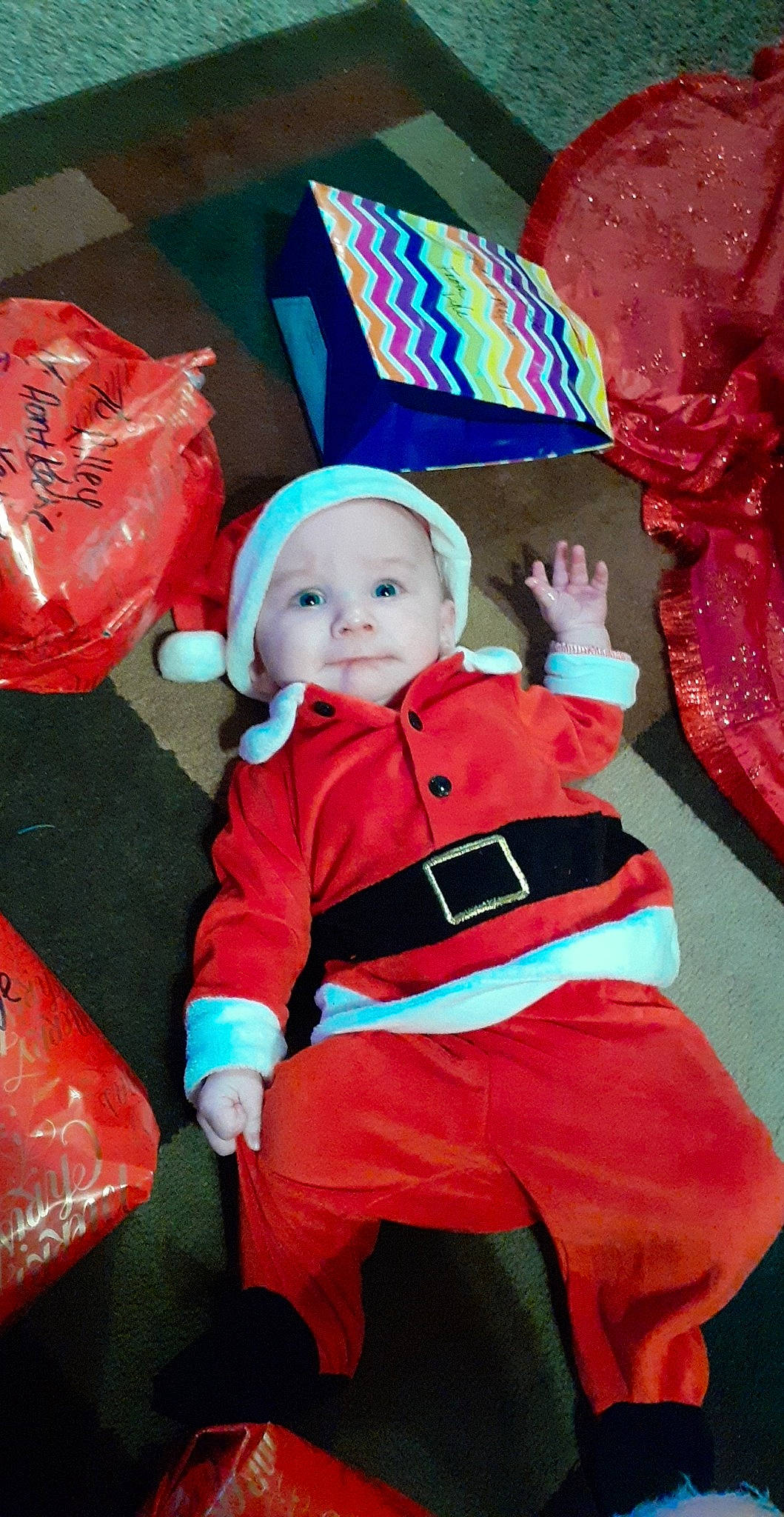 Kylen is registered to the contest to win money with this photo: baby, baby_toddler_clothing, christmas, costume, costume_accessory, costume_hat, headwear, overall, person, toddler
