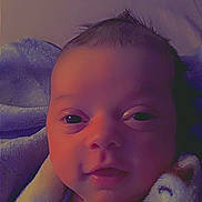 Atlas is registered to the contest to win money with this photo: baby, bed, bedroom, blanket, cushion, doll, face, furniture, head, homedecor, indoors, newborn, person, photography, portrait, purple, quilt, room, towel, toy