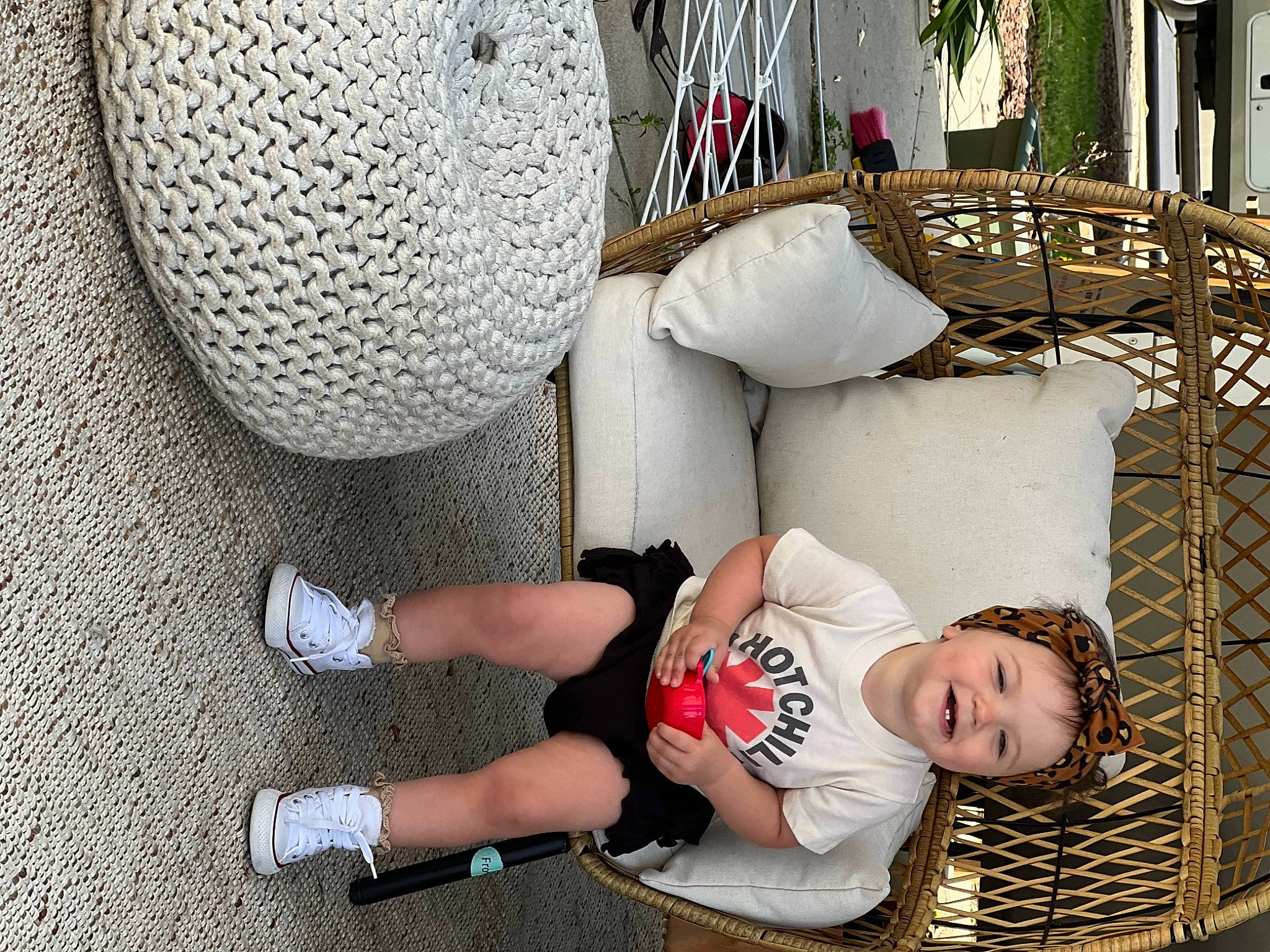 Ellie joined the competition — help win amazing prizes! comfort, fashion_accessory, foot, fun, headgear, human_leg, joy, knee, leg, leisure, mechanical_fan, pattern, person, photograph, public_space, sitting, sock, textile, thigh, toddler