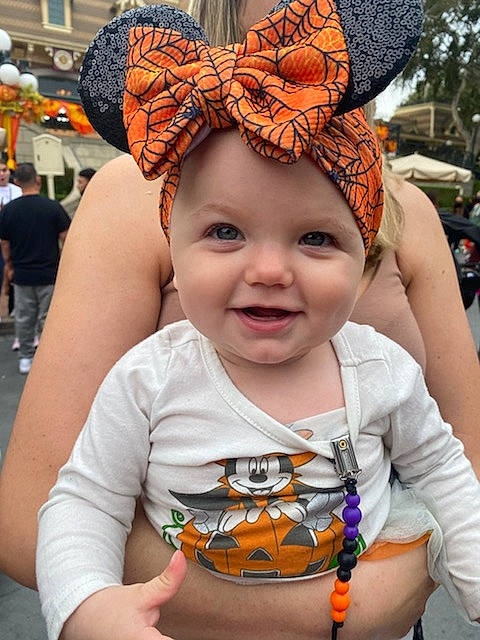 Ellie joined the competition — help win amazing prizes! cap, cool, costume_hat, eye, fun, happy, hat, headgear, headwear, human, joy, leisure, mammal, orange, organ, person, pink, plant, red, smile