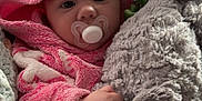 Mollie-Blake joined the competition — help win amazing prizes! baby, pacifier, pink_hood, stuffed_animal, elephant_toy, blanket, knitted_blanket, towel, infant, cute, soft_texture, child, indoor, cozy, portrait, closeup, hand, wrapped, warm, sleepwear