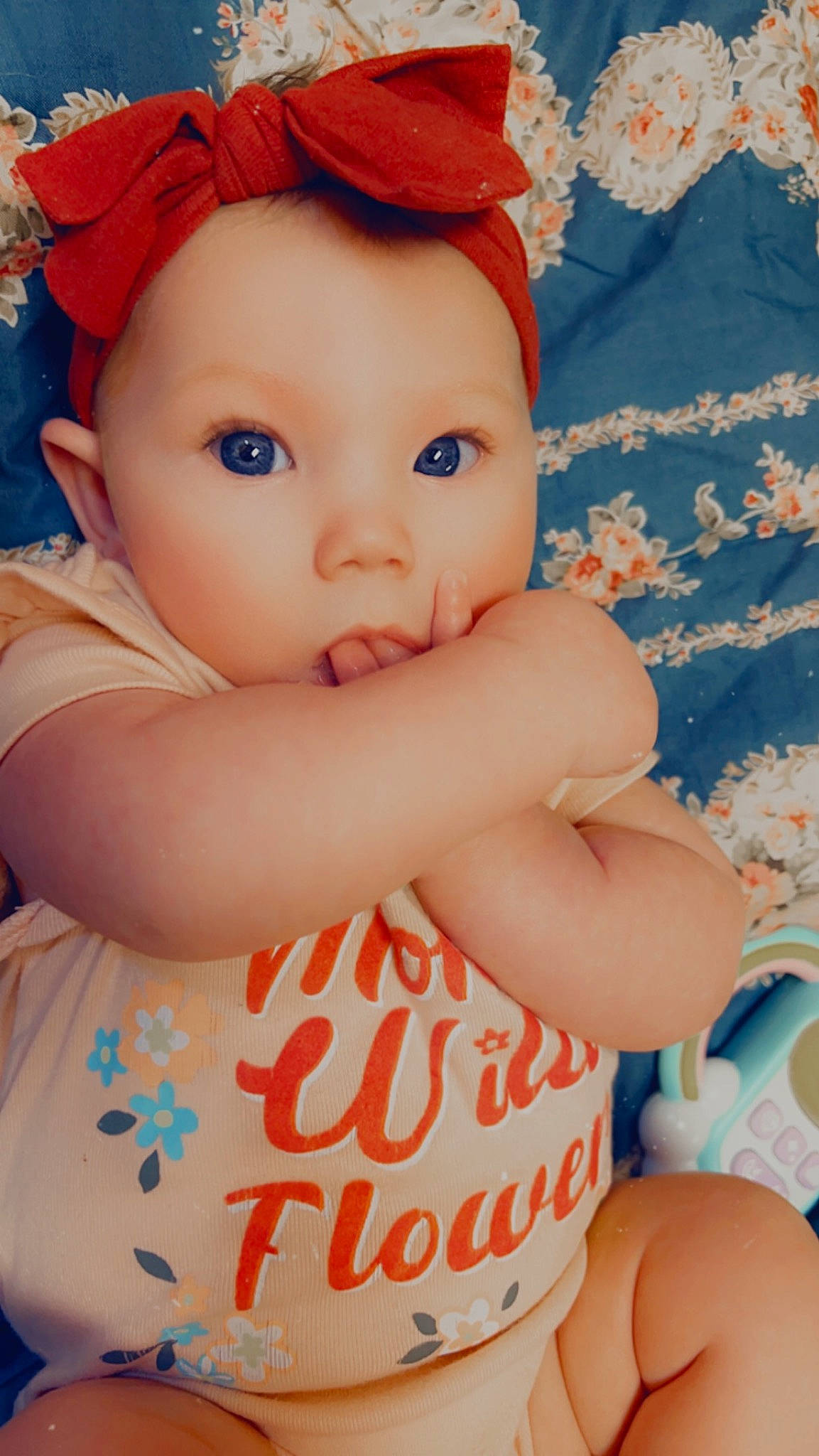 Roxie joined the competition — help win amazing prizes! baby, baby_toddler_clothing, blue, cap, cheek, child, chin, facial_expression, happy, headgear, lip, nose, person, pink, product, skin, sleeve, textile, toddler, wheel