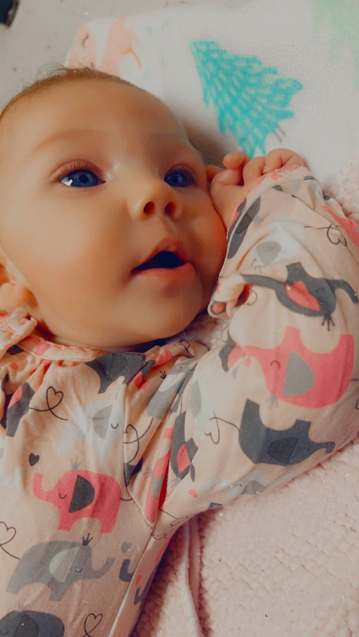 Roxie joined the competition — help win amazing prizes! baby, baby_toddler_clothing, cheek, chin, comfort, eye, eyelash, happy, head, iris, linens, lip, mouth, nose, pattern, person, pink, skin, sleeve, textile