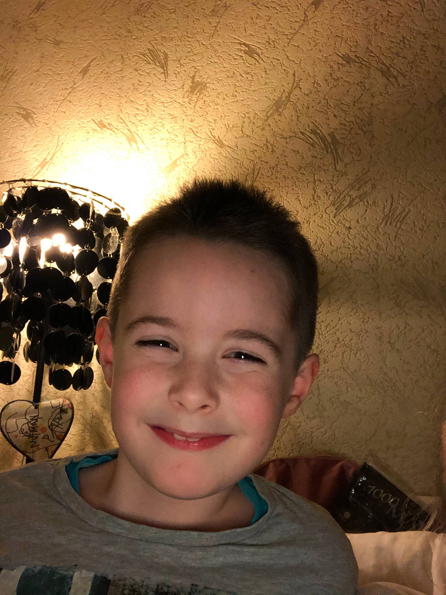Nathan participe au concours pour gagner de l'argent avec cette photo : cheek, child, chin, cool, ear, eye, eyebrow, face, facial_expression, forehead, fun, hair, hairstyle, head, human, jaw, joy, lighting_accessory, mouth, nose
