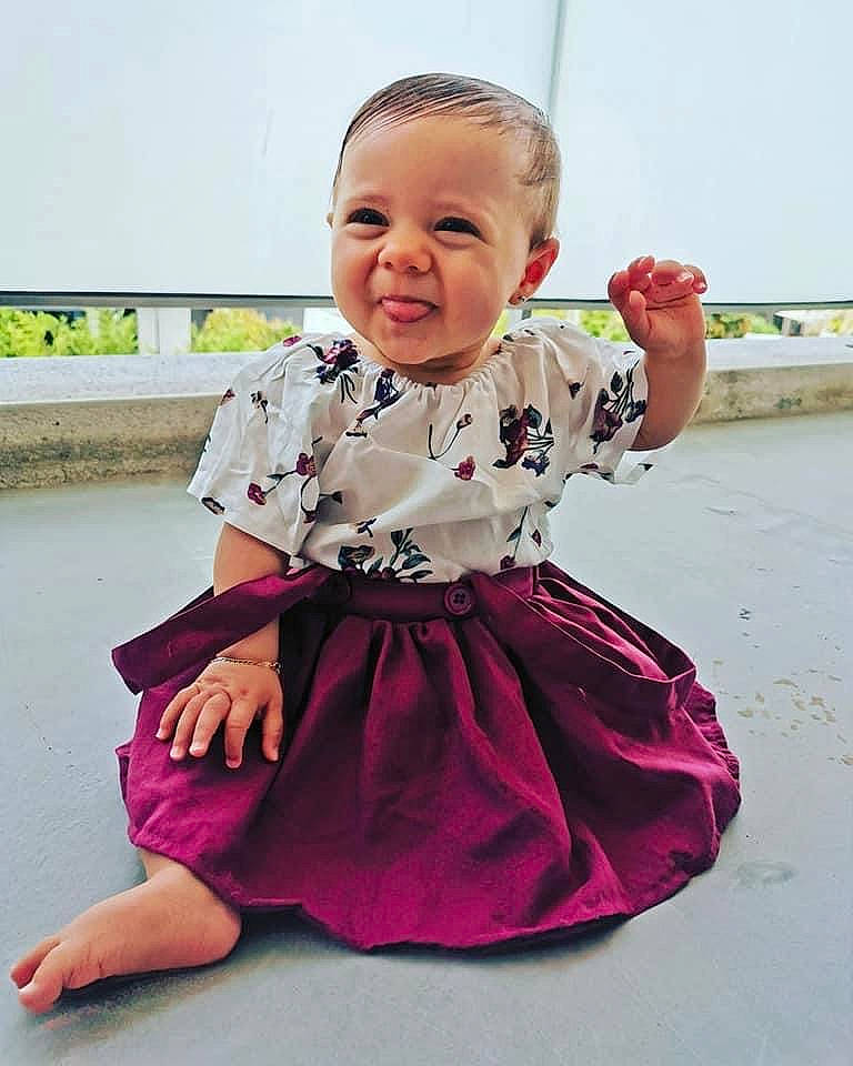 Stacy participe au concours pour gagner de l'argent avec cette photo : baby, baby_toddler_clothing, child, day_dress, dress, embellishment, fun, happy, magenta, pattern, person, pink, purple, sitting, sky, sleeve, smile, standing, t_shirt, toddler