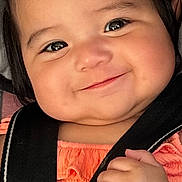 Ariel And Mafia joined the competition — help win amazing prizes! baby, child, smile, face, hands, car_seat, harness, orange_clothing, cute, happy, infant, close_up, seatbelt, safety, young_child, portrait, indoors, skin, person, baby_girl