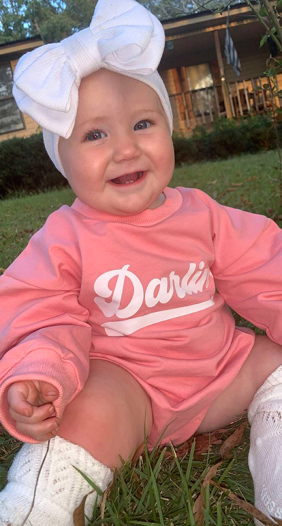 Hadlee joined the competition — help win amazing prizes! baby, baby_toddler_clothing, cap, cool, eye, face, facial_expression, grass, happy, head, headwear, human_body, joy, mouth, people_in_nature, person, pink, plant, skin, smile