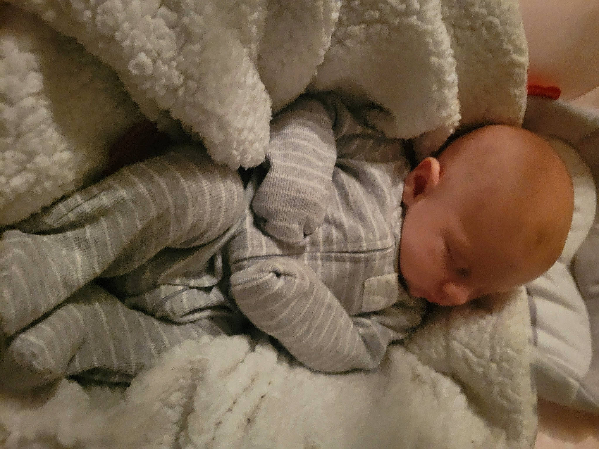 Jade is registered to the contest to win money with this photo: baby, baby_products, baby_sleeping, baby_toddler_clothing, bed_sheet, bedding, bedtime, child, comfort, fur, gesture, hand, linens, nap, person, room, skin, sleep, textile, toddler
