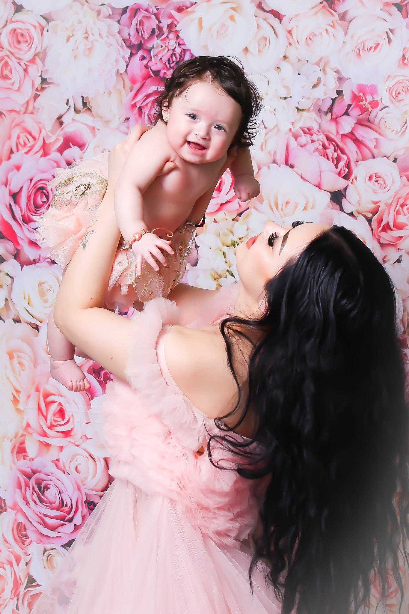 Yvette is registered to the contest to win money with this photo: arm, black_hair, dress, eye, eyelash, face, flash_photography, gown, hair, hairstyle, hand, happy, head, joy, person, petal, pink, shoulder, skin, textile